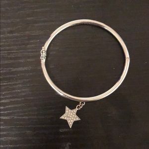 Kate Spade silver star hinges cuff bracelet.